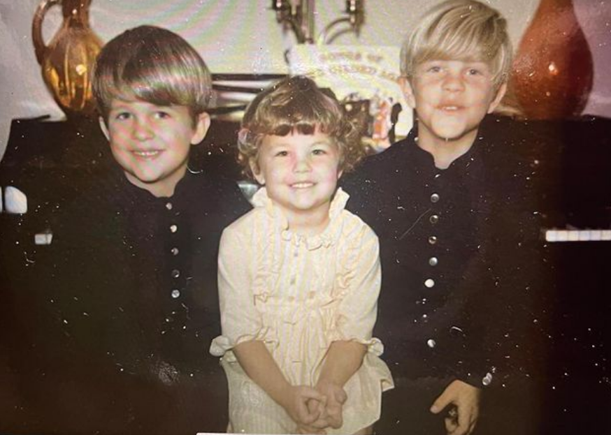 Sherilyn and her two bigger brothers