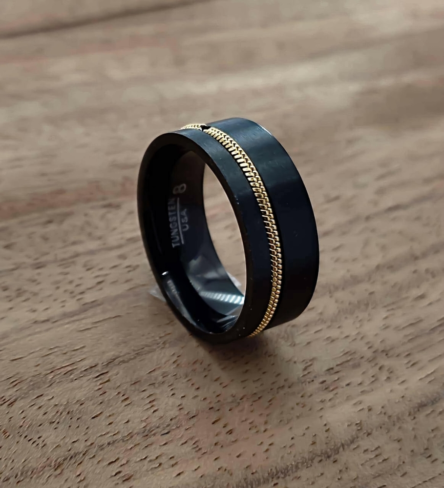 A black ring On a wooden background