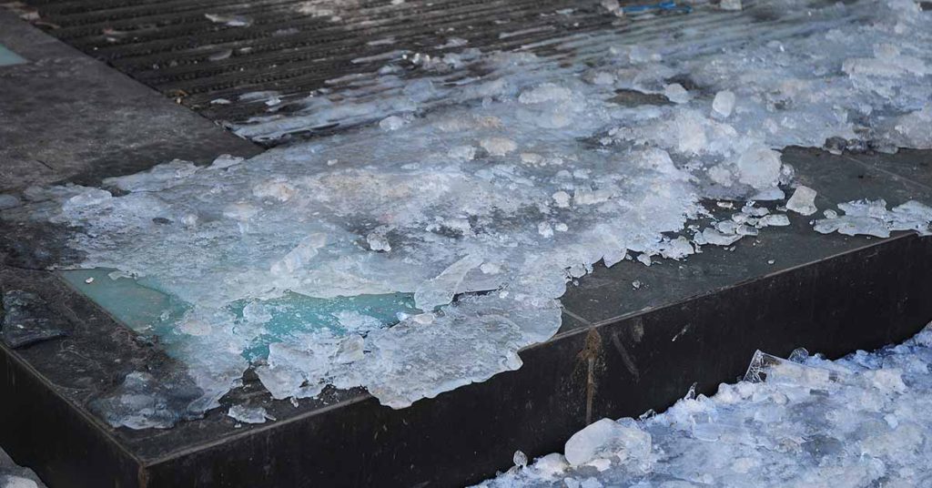 How to Effectively and Safely De-Ice Your Walkways This Winter - Featured image