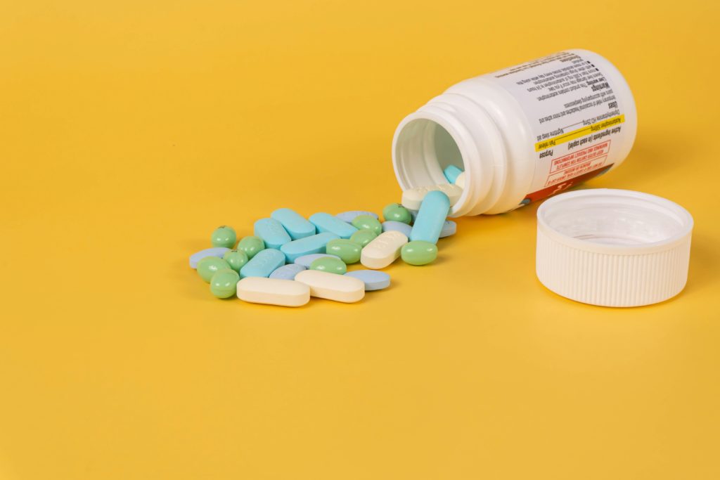 medicine bottle containing pills