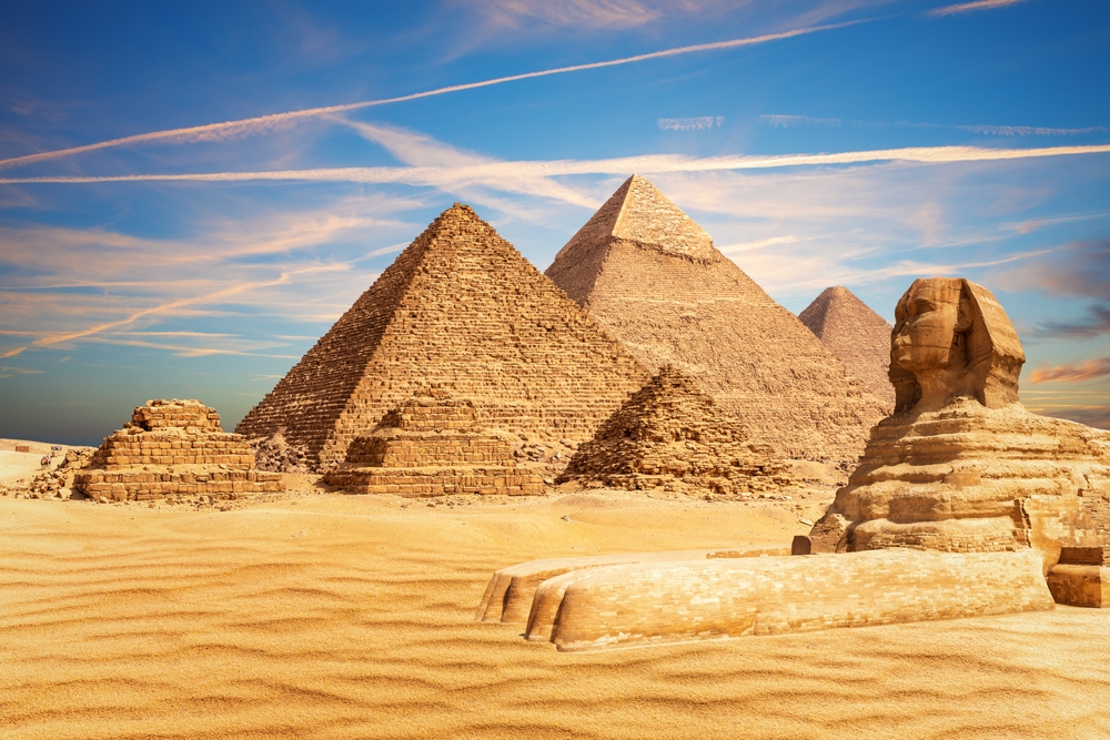 The Great Sphinx bythe Pyramids of Egypt and its companions in the sands of Giza desert, Egypt