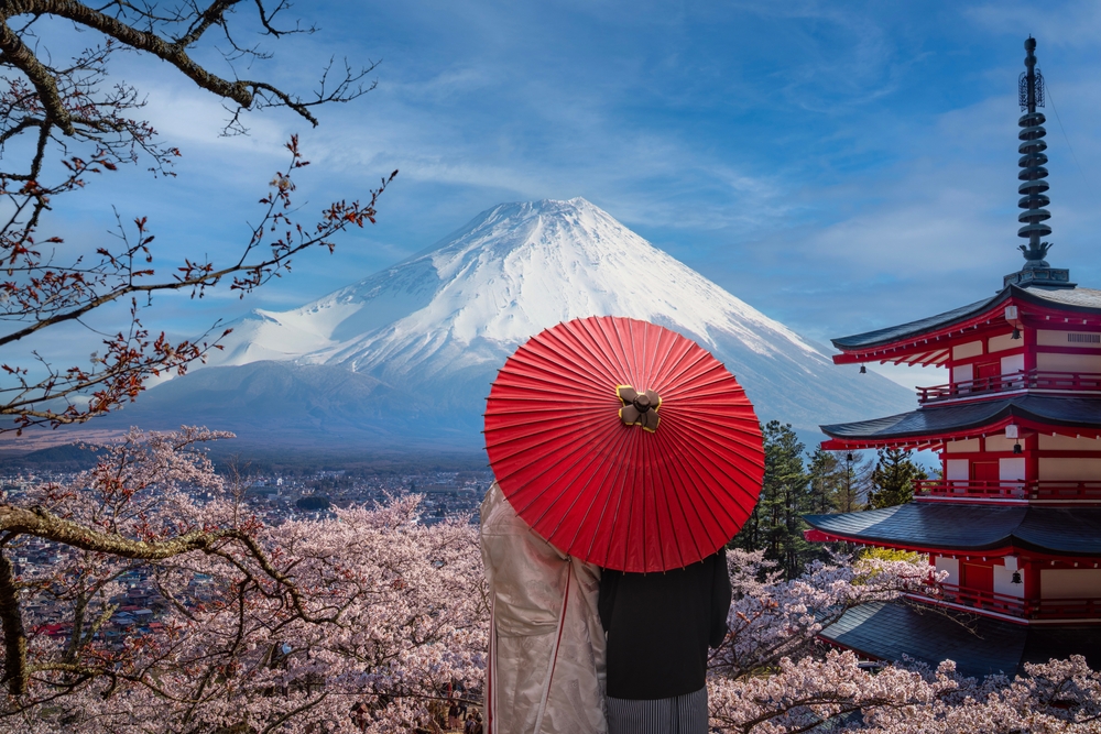 Fujiyoshida, Red Tower and Cherry Blossom Park With Mount Fuji in the background, it is a popular viewpoint in Tokyo. Japan