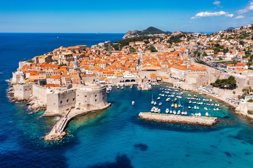 Dubrovnik a city in southern Croatia fronting the Adriatic Sea, Europe. Old city center of famous town Dubrovnik, Croatia. Picturesque view on Dubrovnik old town (medieval Ragusa) and Dalmatian Coast.