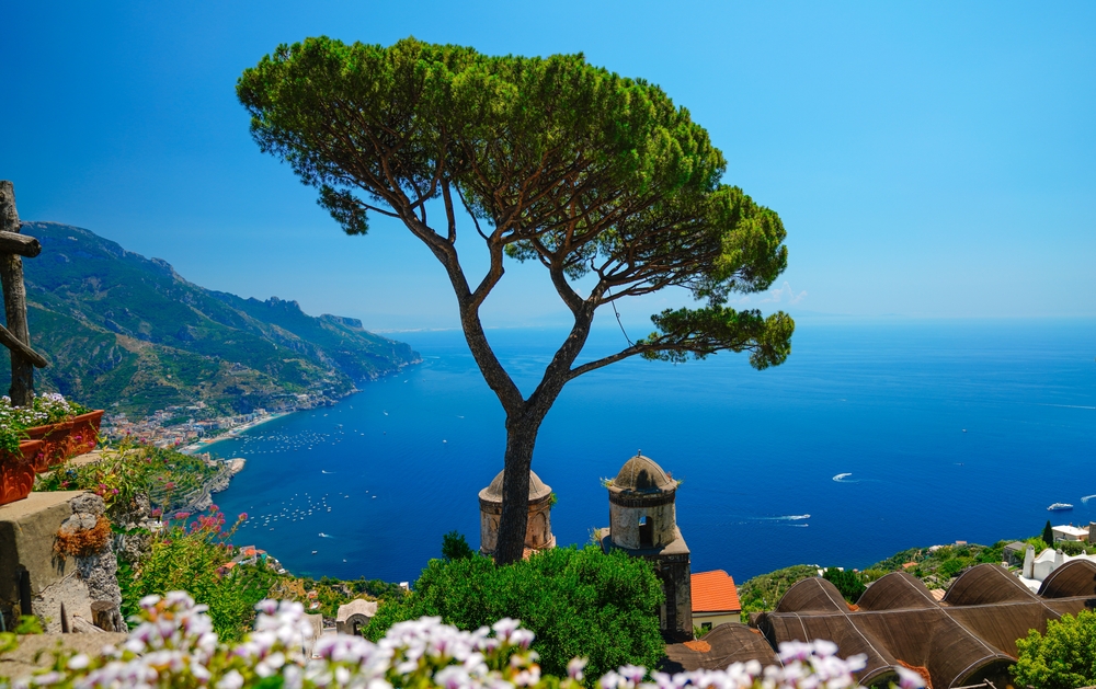 Ravello town on Amalfi coast, view from the terrace of villa Rufolo, mediterranean, blue sea, view over the two dome church of Ravello, famous umbrella tree, garden , Tyrrhenian sea, city of music