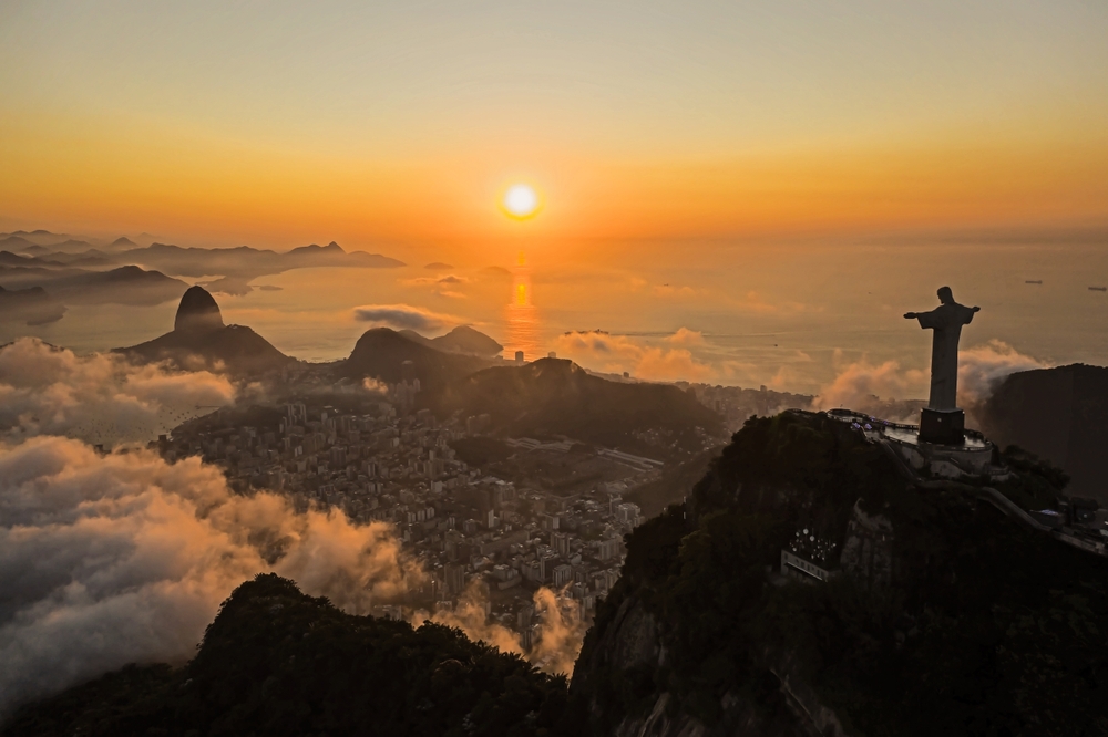 Drone view of Christ the Redeemer during the sunrise over Guanamara Bay in Rio de Janeiro