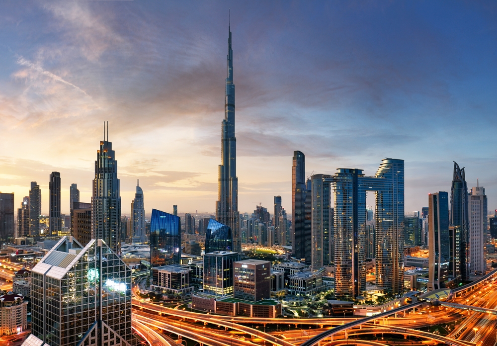 Dubai skyline at sunset with Burj Khalifa - aerial view, United Arab Emirates