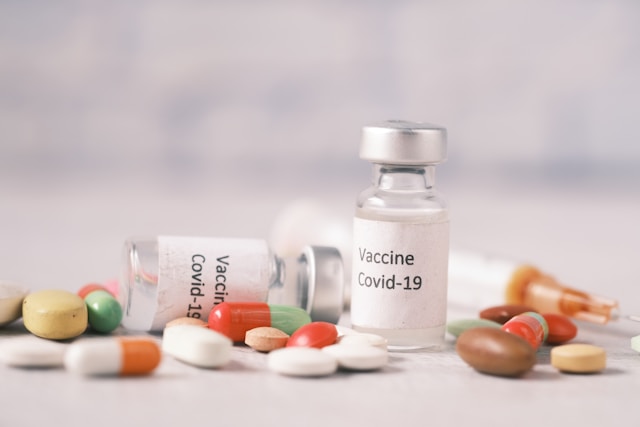 vaccine bottle with pills