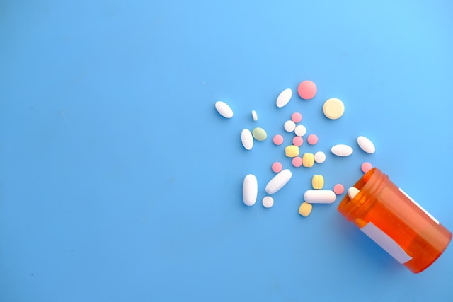 medicine bottle containing pills