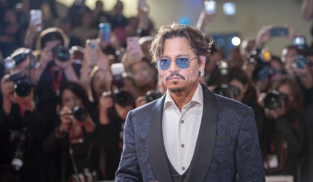 Johnny Depp walks the red carpet ahead of the ''Waiting For The Barbarians'' screening during the 76th Venice Film Festival at Sala Grande on September 06, 2019 in Venice, Italy.