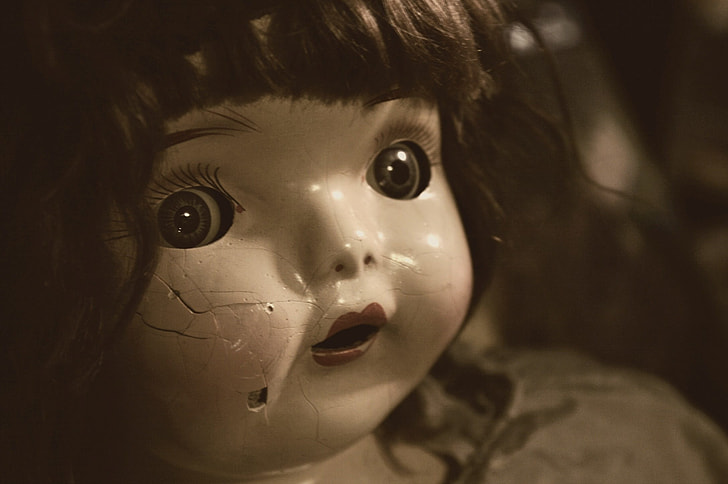 The Doll with the Cracked Face