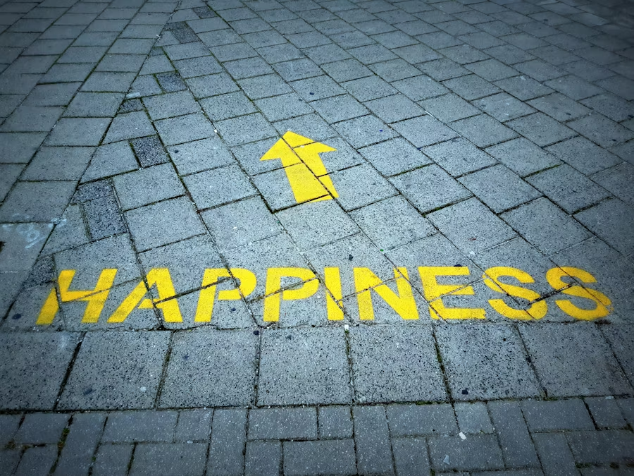 an arrow on the ground pointing towards happiness
