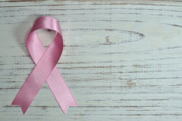 pink ribbon on a table