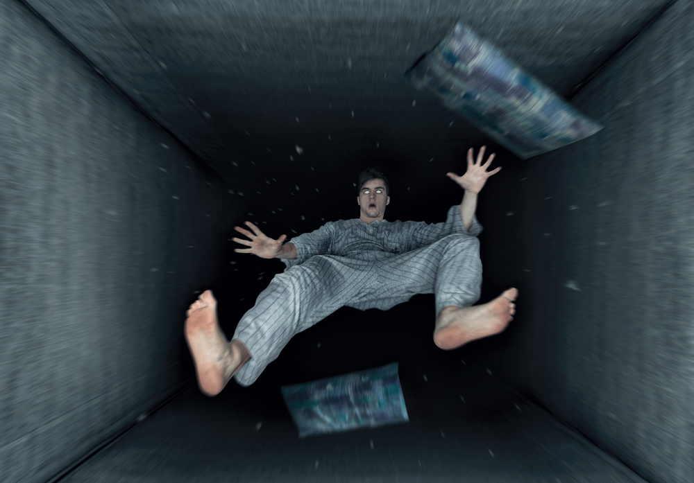 A dreaming guy with the sensation of falling
