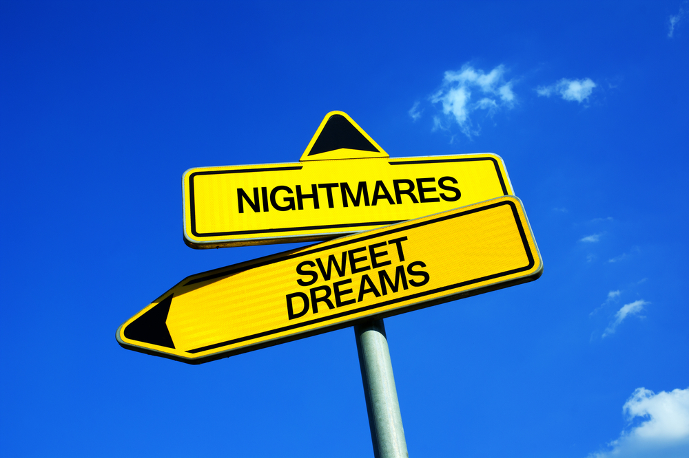 Nightmares vs Sweet Dreams - Traffic sign with two options - unpleasant, scary and frightening dreaming during sleeping vs nice and positive sensations in mind
