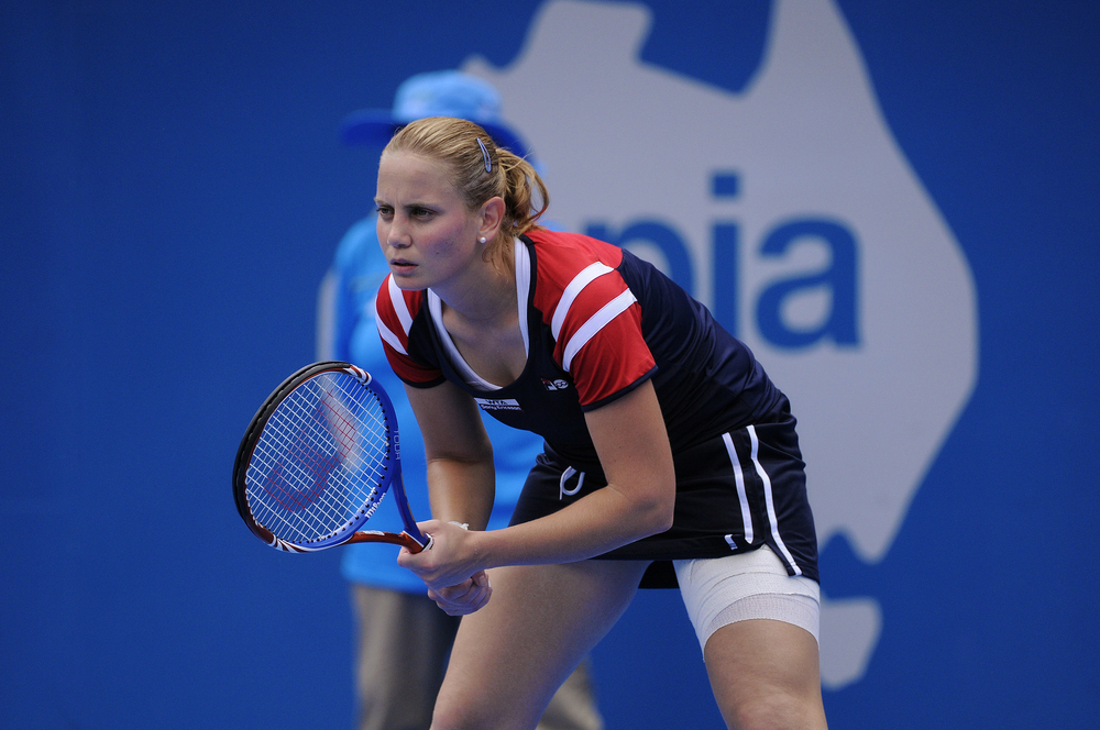 SYDNEY - JAN 8: Australia's Jelena Dokic waits to return serve in her first round match in the APIA Tennis International. Sydney - January 8, 2012
