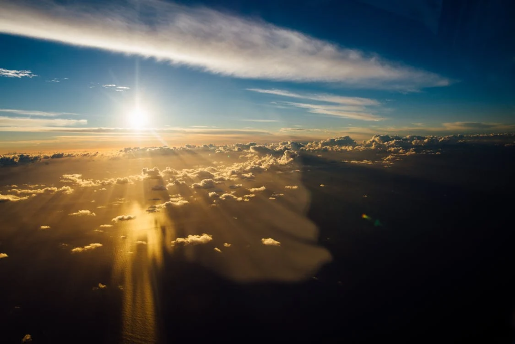 aerial view of clouds and sun