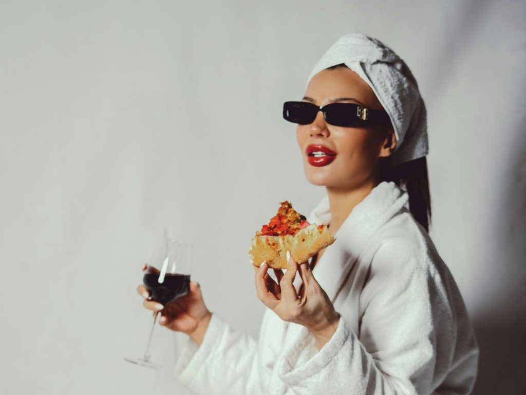 Elegant Woman Enjoying Pizza