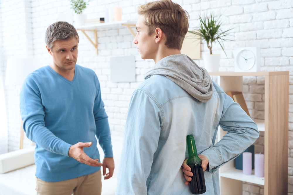 The son hid alcohol from dad and dad insists that he give the bottle. Dad alcoholic asks his son to give him a bottle of beer.