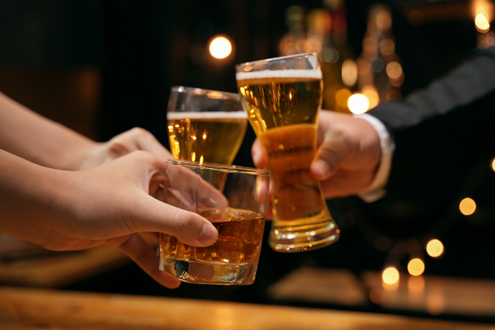 Celebrate whiskey on a friendly party in restaurant
