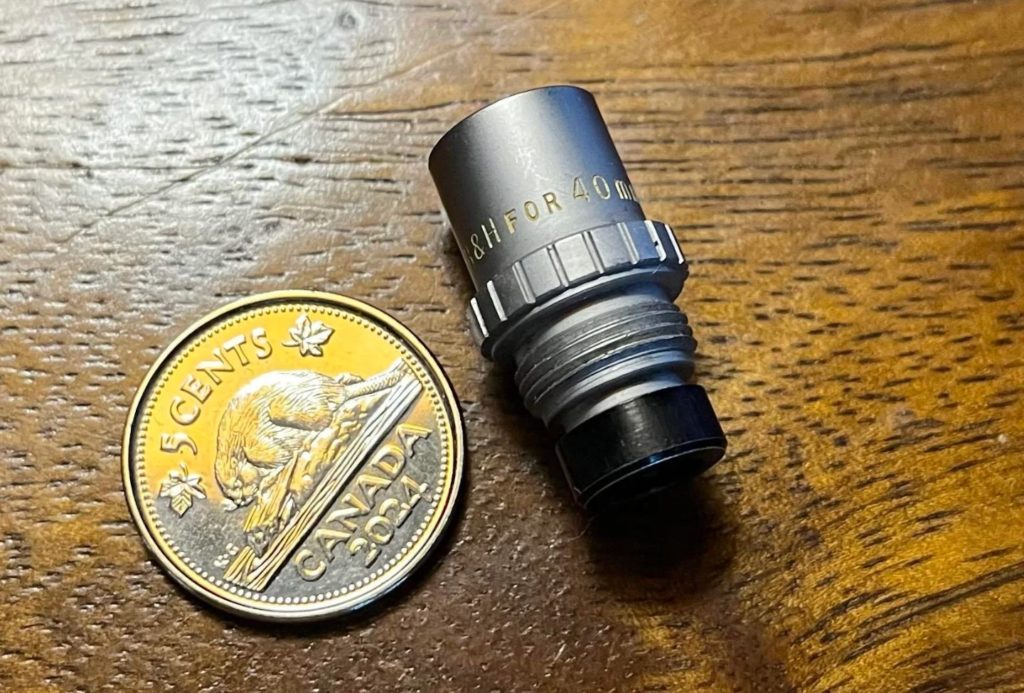 small mystery item near coin