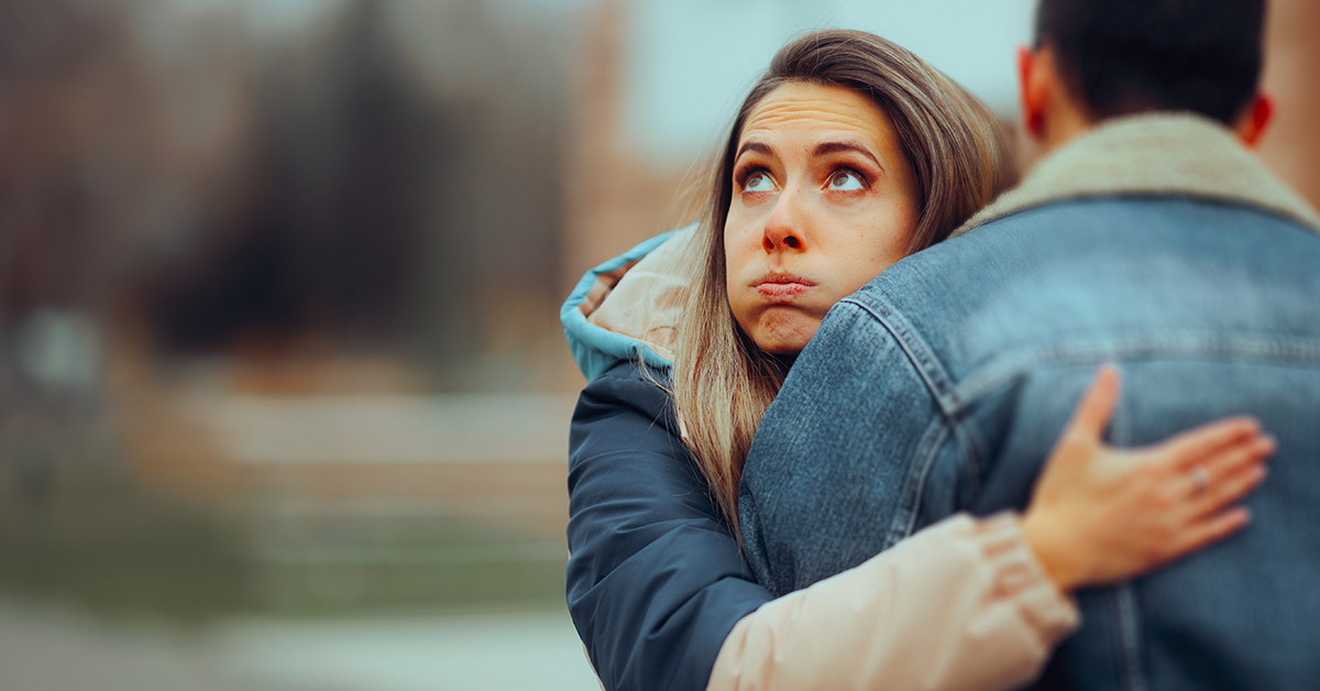 woman hugging man