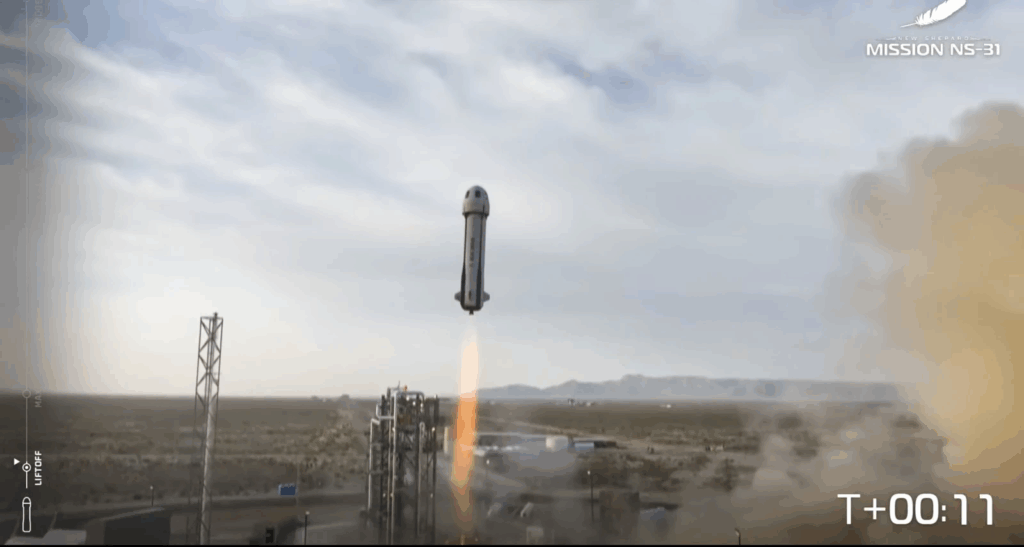 New Shepard space craft taking off from a camera at the launch site. 