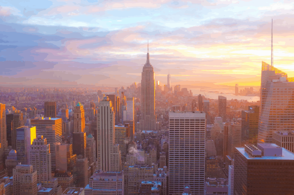 New York City skyline at sunset with the Empire State Building prominently featured, where residents face significant variations in food category prices.