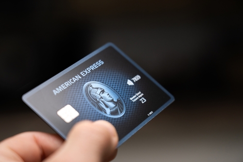 Vancouver, BC, Canada - September 20, 2024: Person holding an American Express Card, AMEX Card
