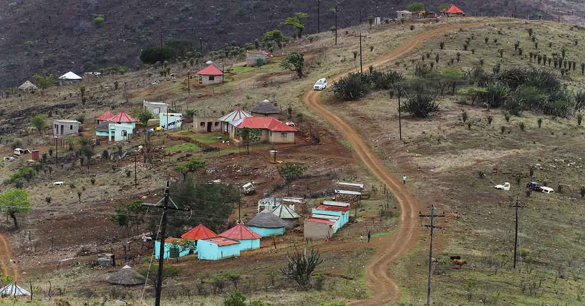 A truck drives through a rural community in Zululand in northern KwaZulu-Natal, South Africa.