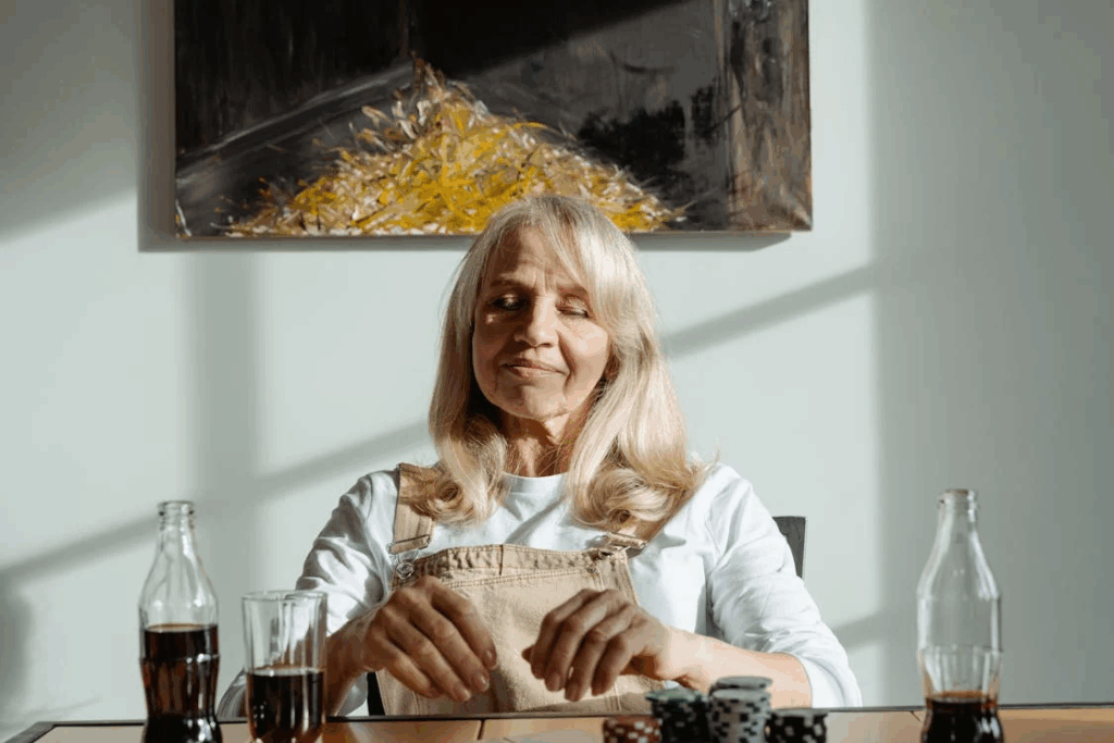 Woman smiling while playing poker