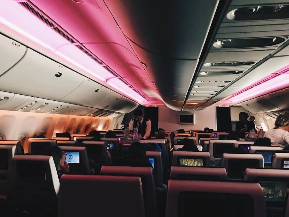 Airplane Interior with Passengers on their Seats