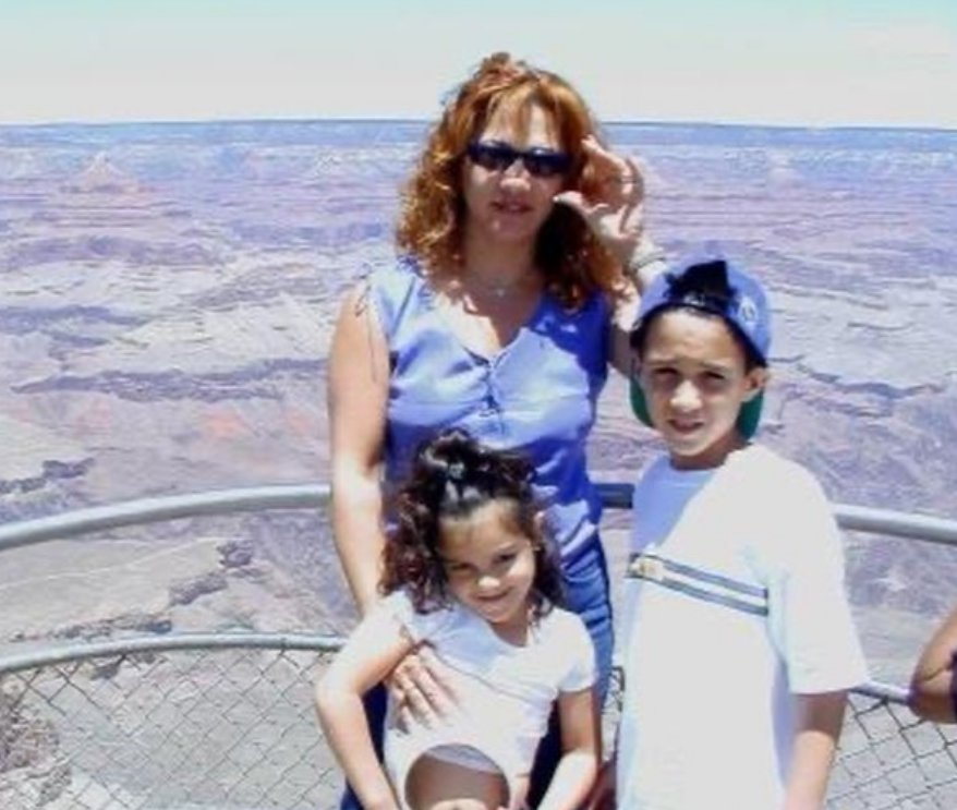 Adam with his mother and sister