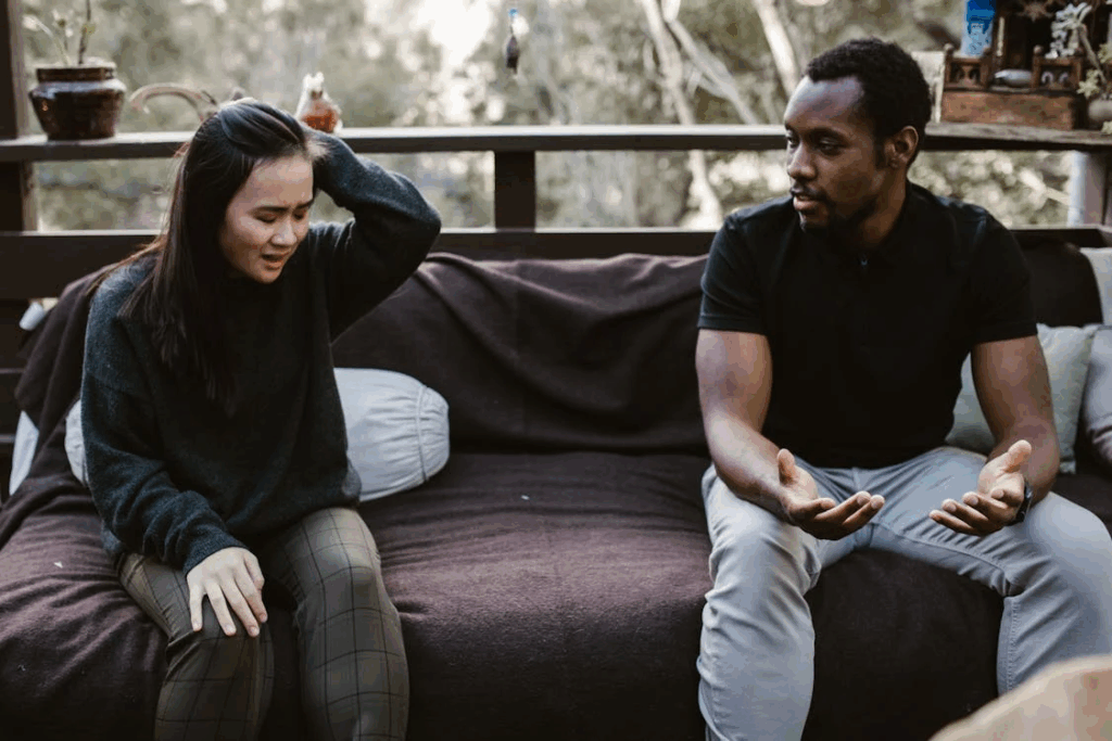 A Man Talking to a Woman