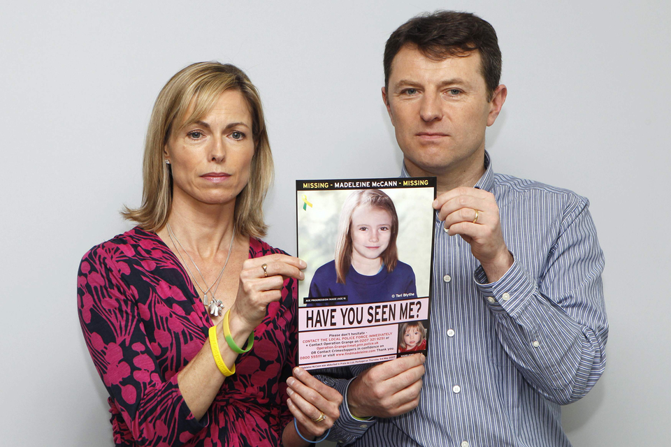 Kate and Gerry McCann with a computer image of how their missing daughter Madeleine might look