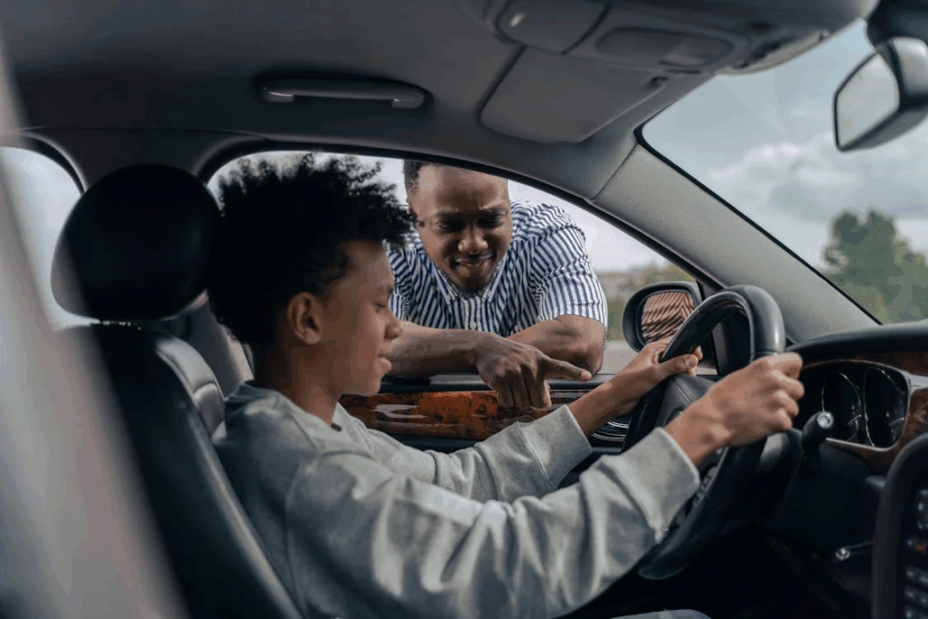 A father and Son inside a Car ready for a driving lesson