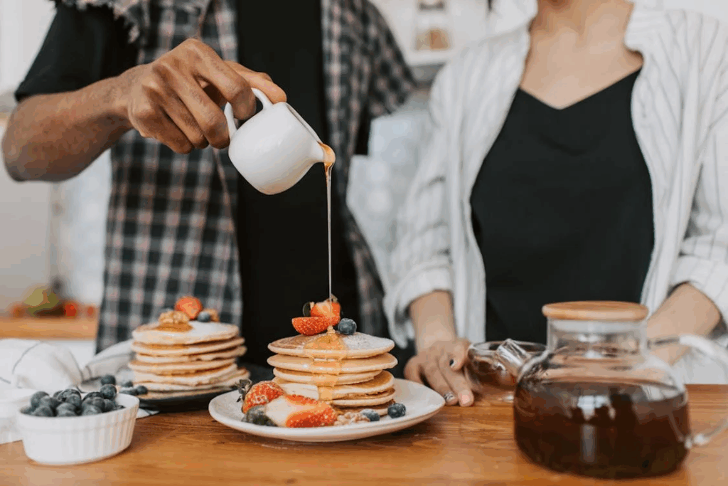 Single dad Jack and Claire eating pancakes