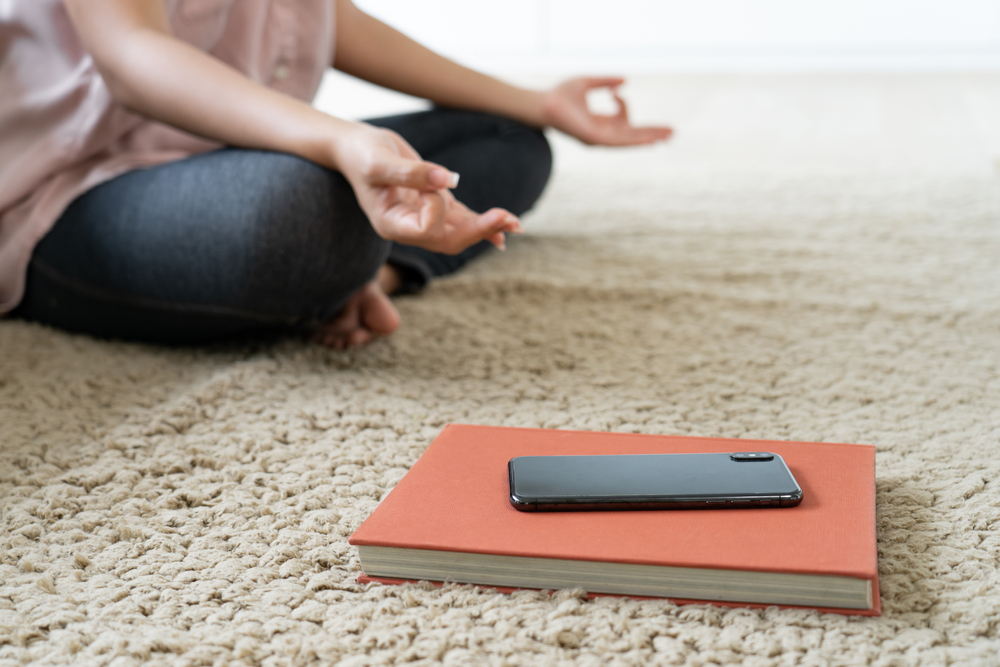 woman break time pose Yoga meditation and turn off mobile phone and disconnect internet