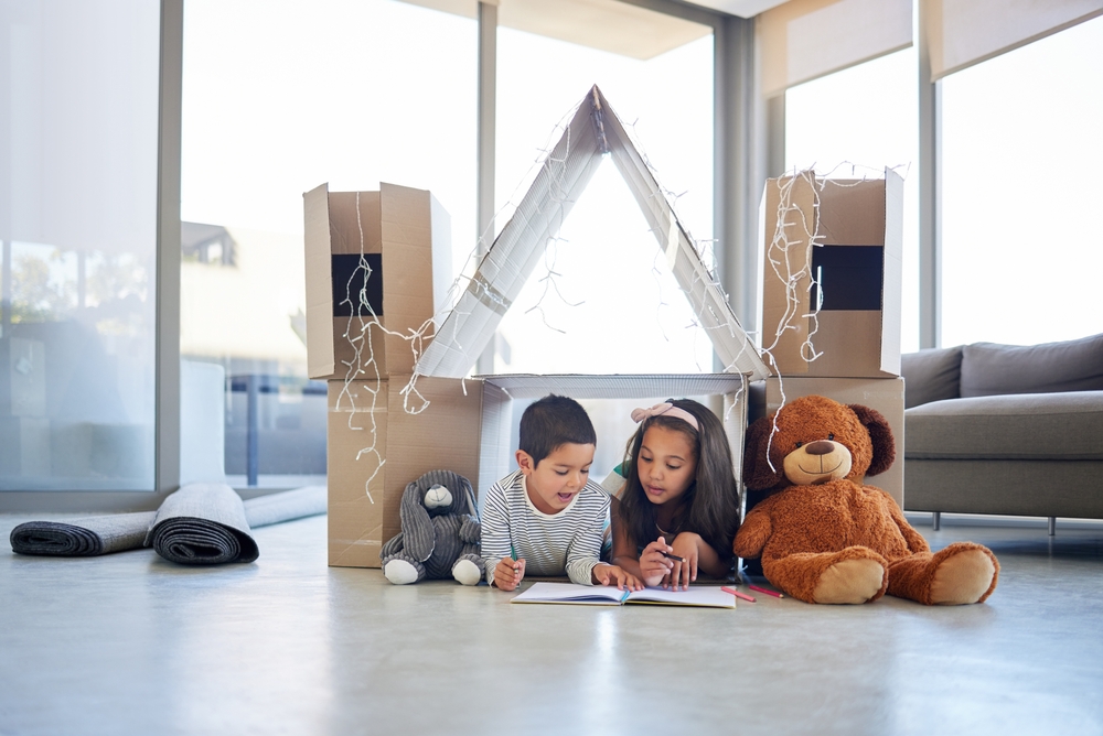 Children, playing and drawing in sketchbook for fun, hobby and entertainment in home for education. Young people, kids and learning for youth development, growth or creativity as siblings in bonding