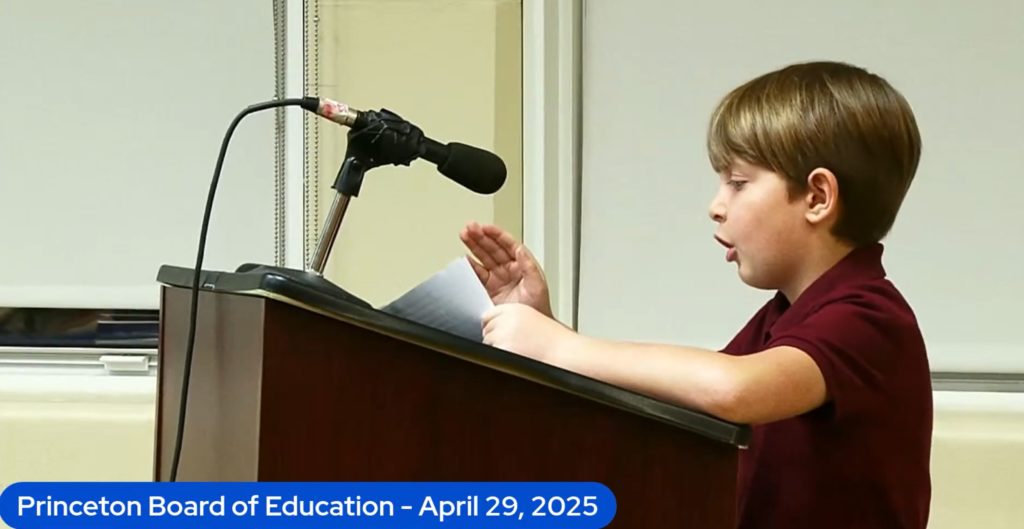 Teddy speaking in front of the school board