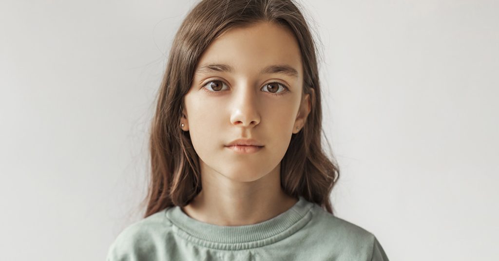 The Lifelong Impact of Kids Forced to Grow Up Too Soon - Featured image