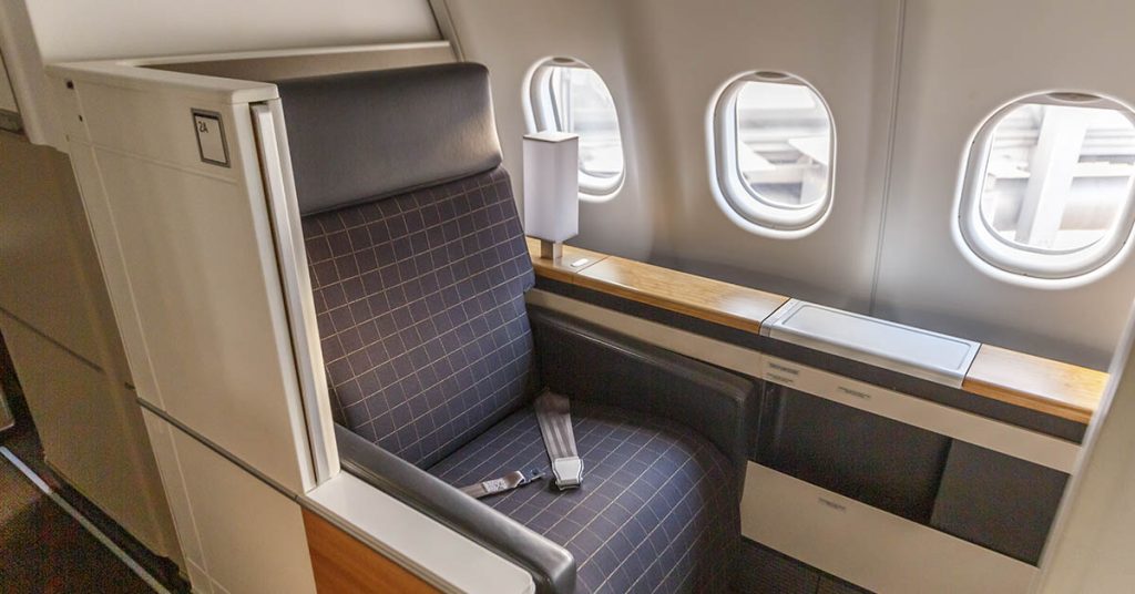 How to Get Upgraded to First Class: Secrets from a Flight Attendant - Featured image