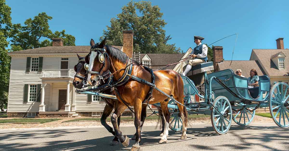 Williamsburg, Virginia. Man riding horse and carriage