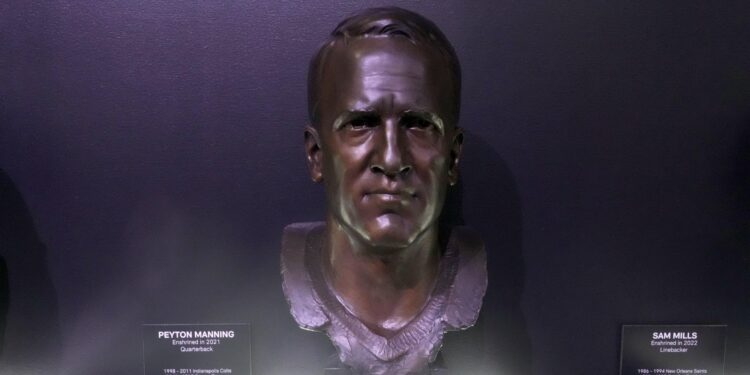 Feb 8, 2025; New Orleans, LA, USA; The bust of Peyton Manning at the Pro Football Hall of Fame exhibit at the Super Bowl LIX Experience at the Ernest N. Morial Convention Center.