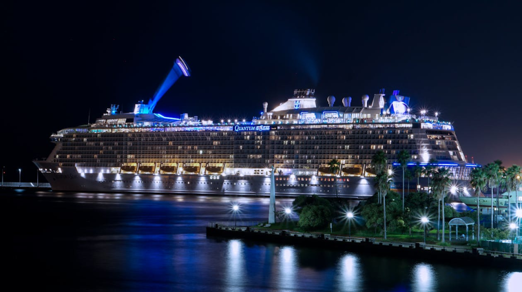 Lit up Ship on Ocean at Night
