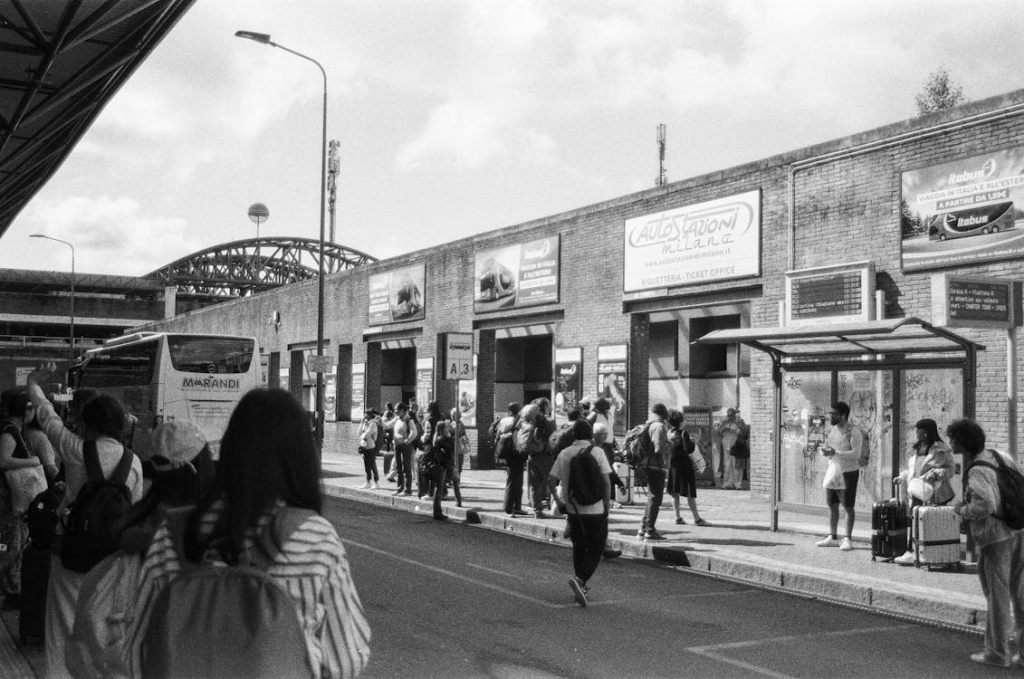 Busy Street Scene at Milan Bus Station