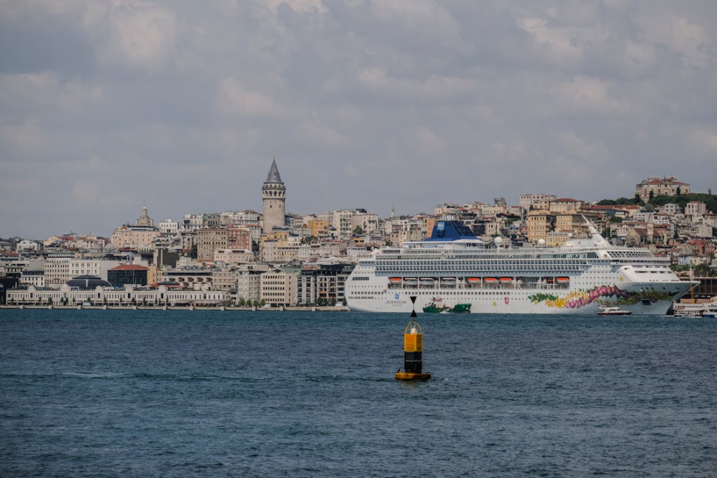 Cruise Ship Passing Galata Tower in Istanbul