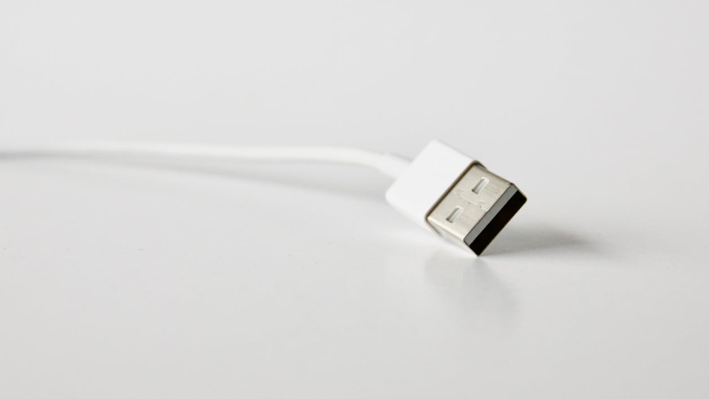 Close-Up Photo of White Usb Cable