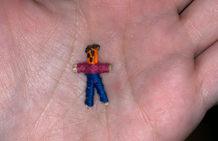 The mysterious object in the image is a worry doll