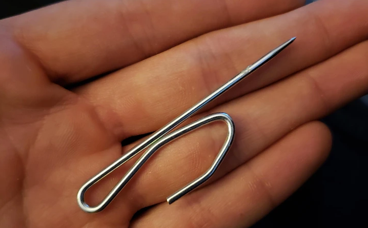 The object in the image is a curtain hook