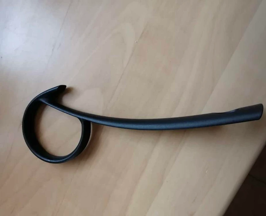 The item in the image is a ring pull can opener